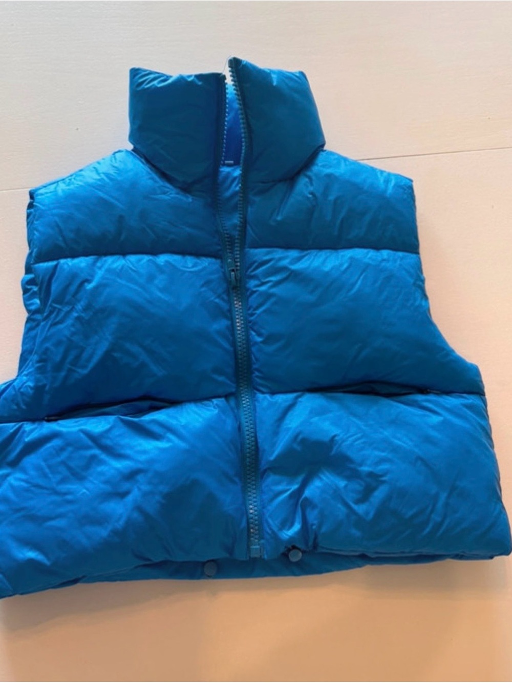 Woman's Blue Puffer Vest with adjustable waist #winterwear #puffer
